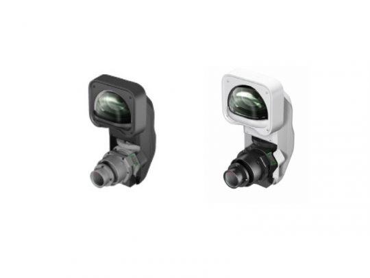 Zwei kompakte Überwachungskameras, Modell "CompactCam", in Schwarz und Weiß nebeneinander vor weißem Hintergrund. Beide Kameras haben ein großes Objektiv und ein modernes, schlankes Design - ideal zum Mieten oder Kaufen.